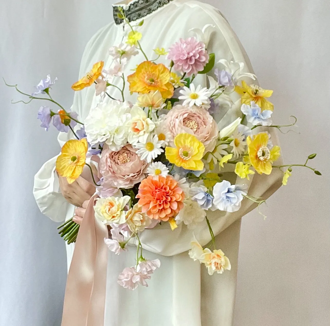 ポピー、ラナンキュラスふんわりクラッチブーケ