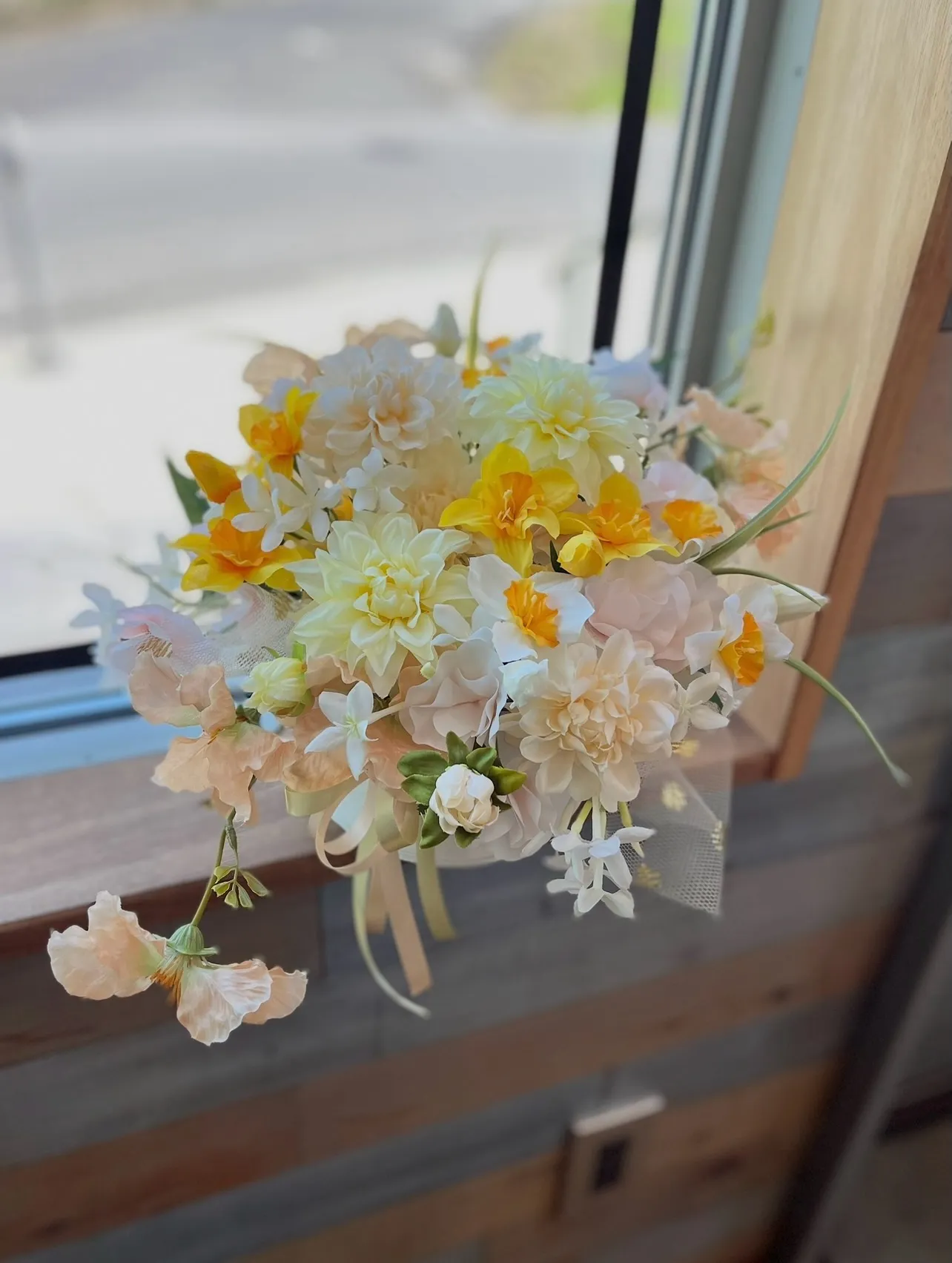 家族4人の誕生花を入れたアレンジメント。