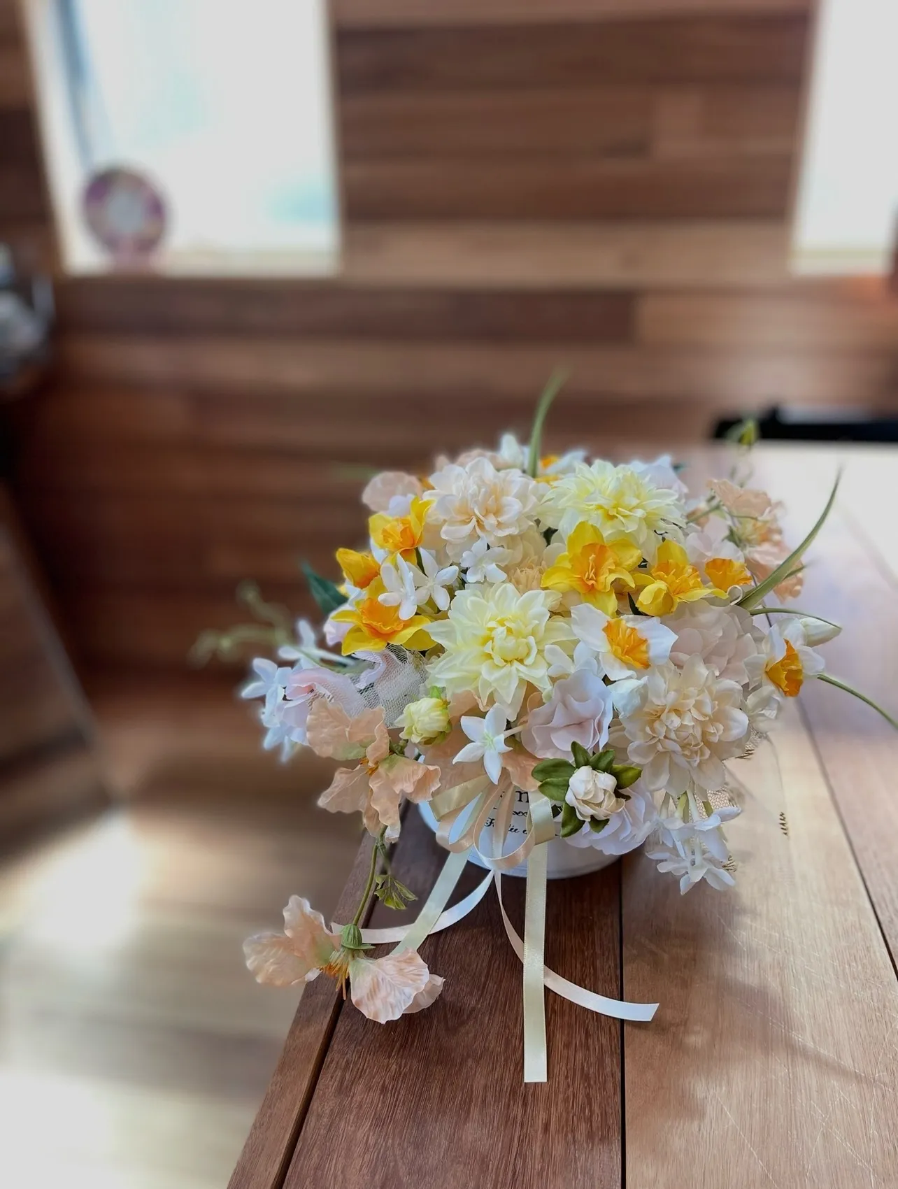 家族4人の誕生花を入れたアレンジメント。